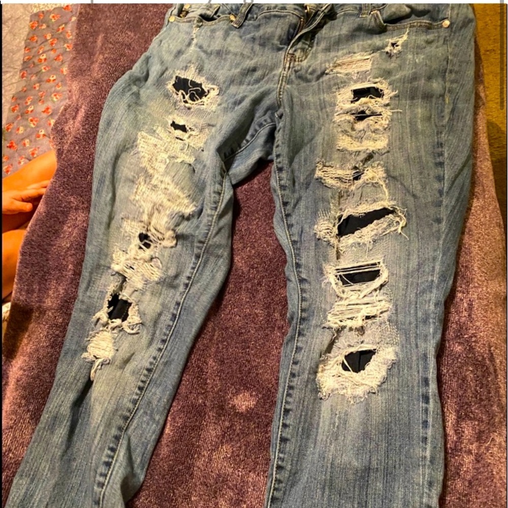 Distressed boyfriend blue jeans